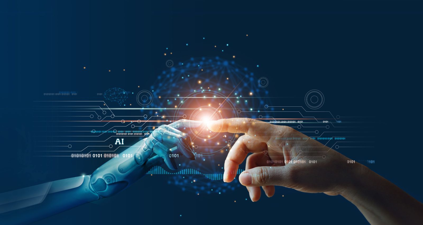 AI (artificial intelligence) - Hands of robot and human touching on big data network connection by PopTika via Shutterstock