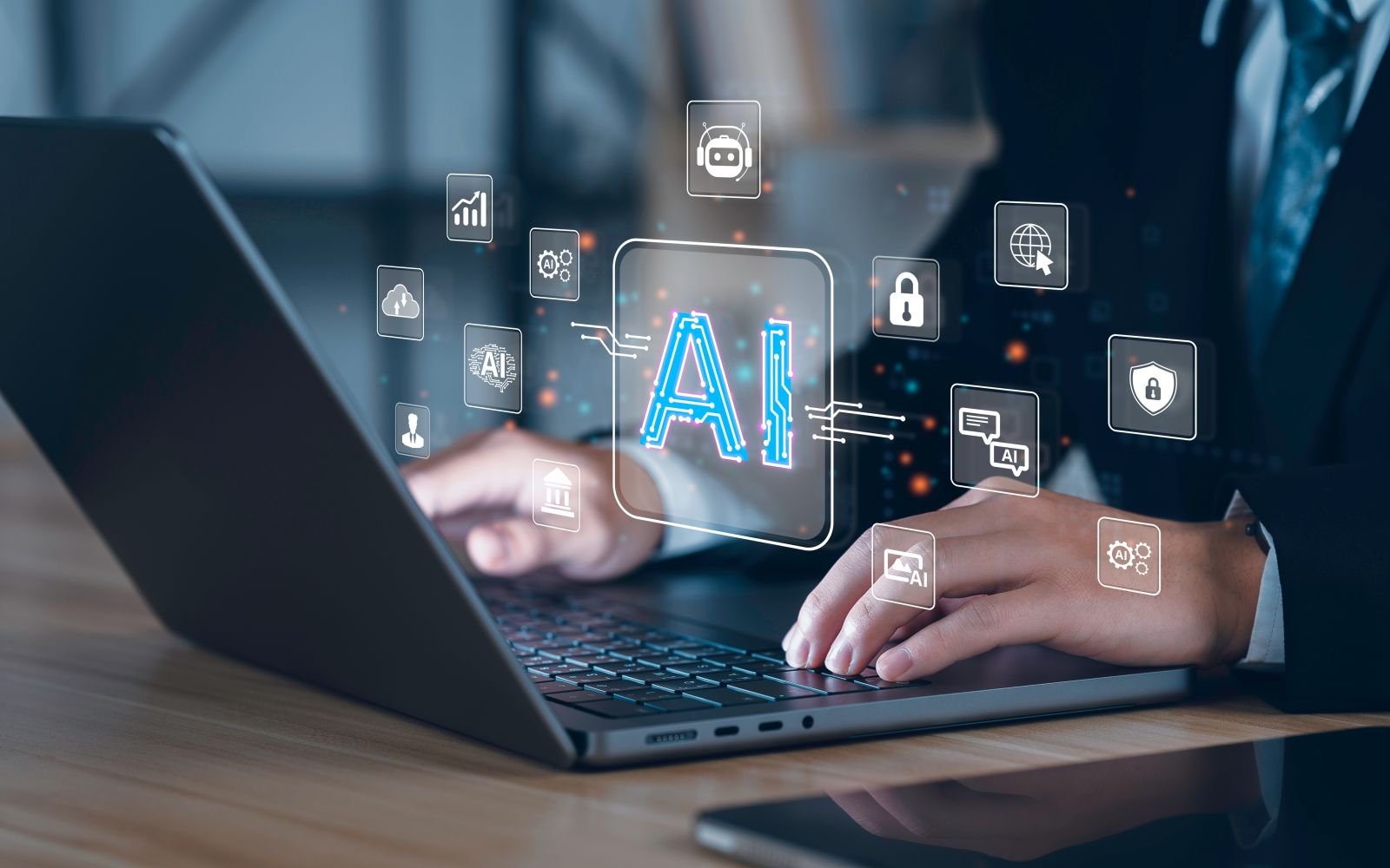 AI (artificial intelligence) - businessman using technology AI for working tools by Deemerwha studio via Shutterstock