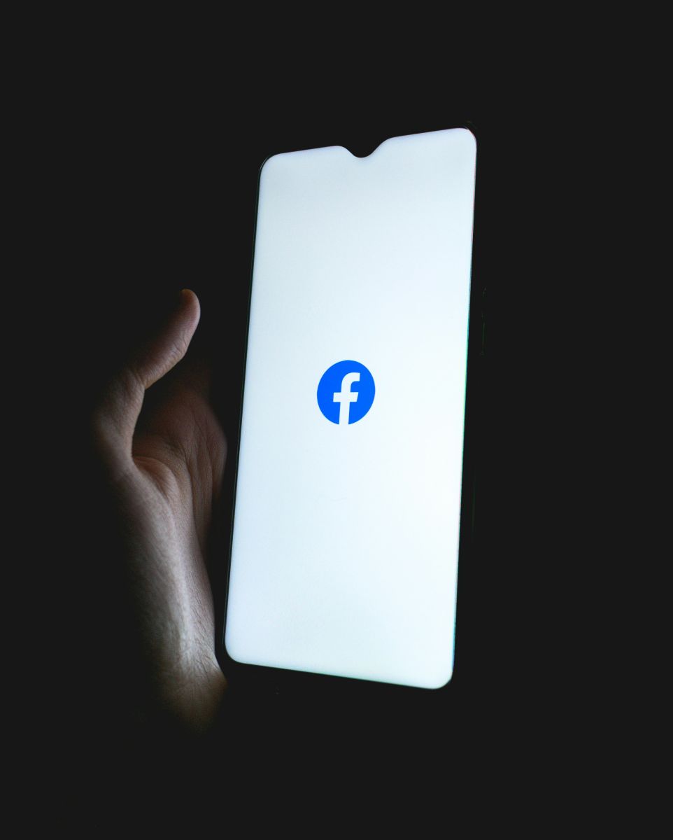 Tech (Ecommerce, Social Media, etc.) - Facebook icon on a cell phone by Dawid Sokolowski via Unsplash