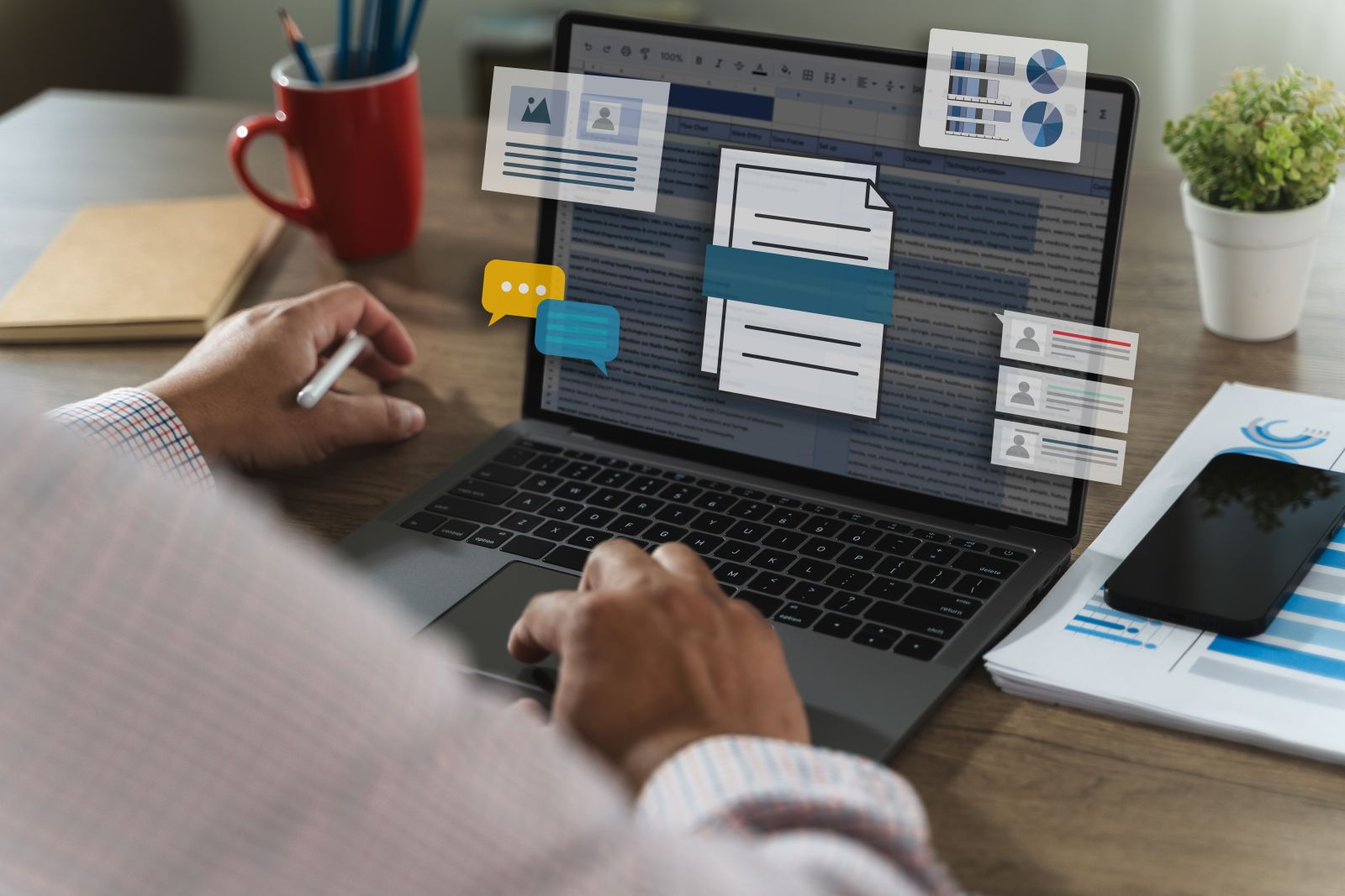 Man working with data and graphs in spreadsheet documents by one photo via Shutterstock