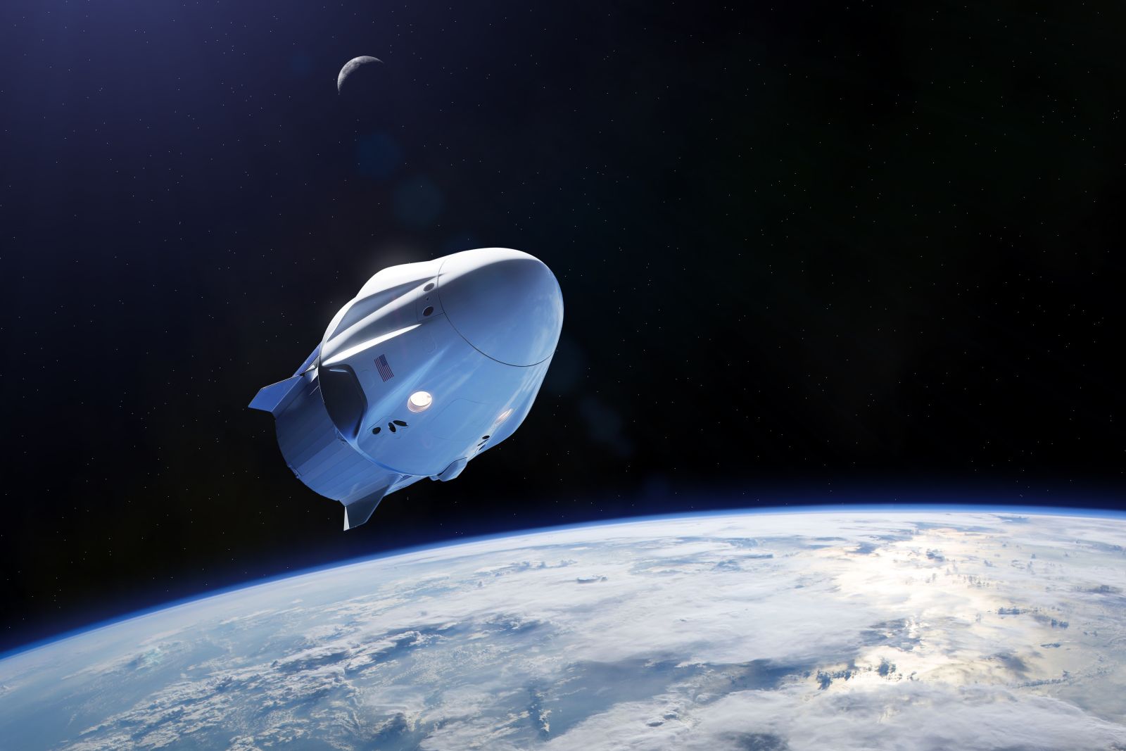 Cargo spacecraft in low-Earth orbit by Paopano via Shutterstock