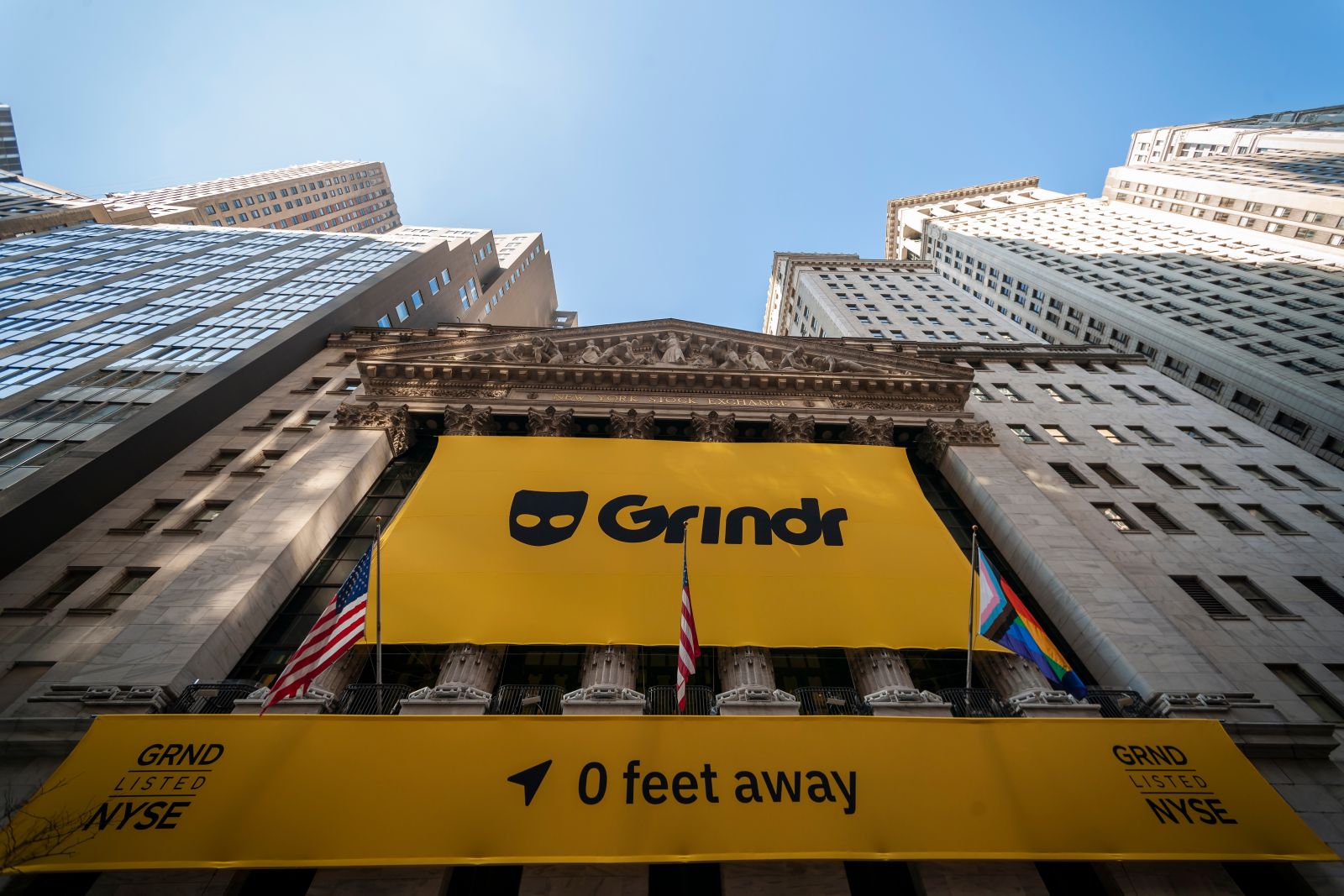 The Grindr logo on the New York Stock Exchange by rblfmr via Shutterstock