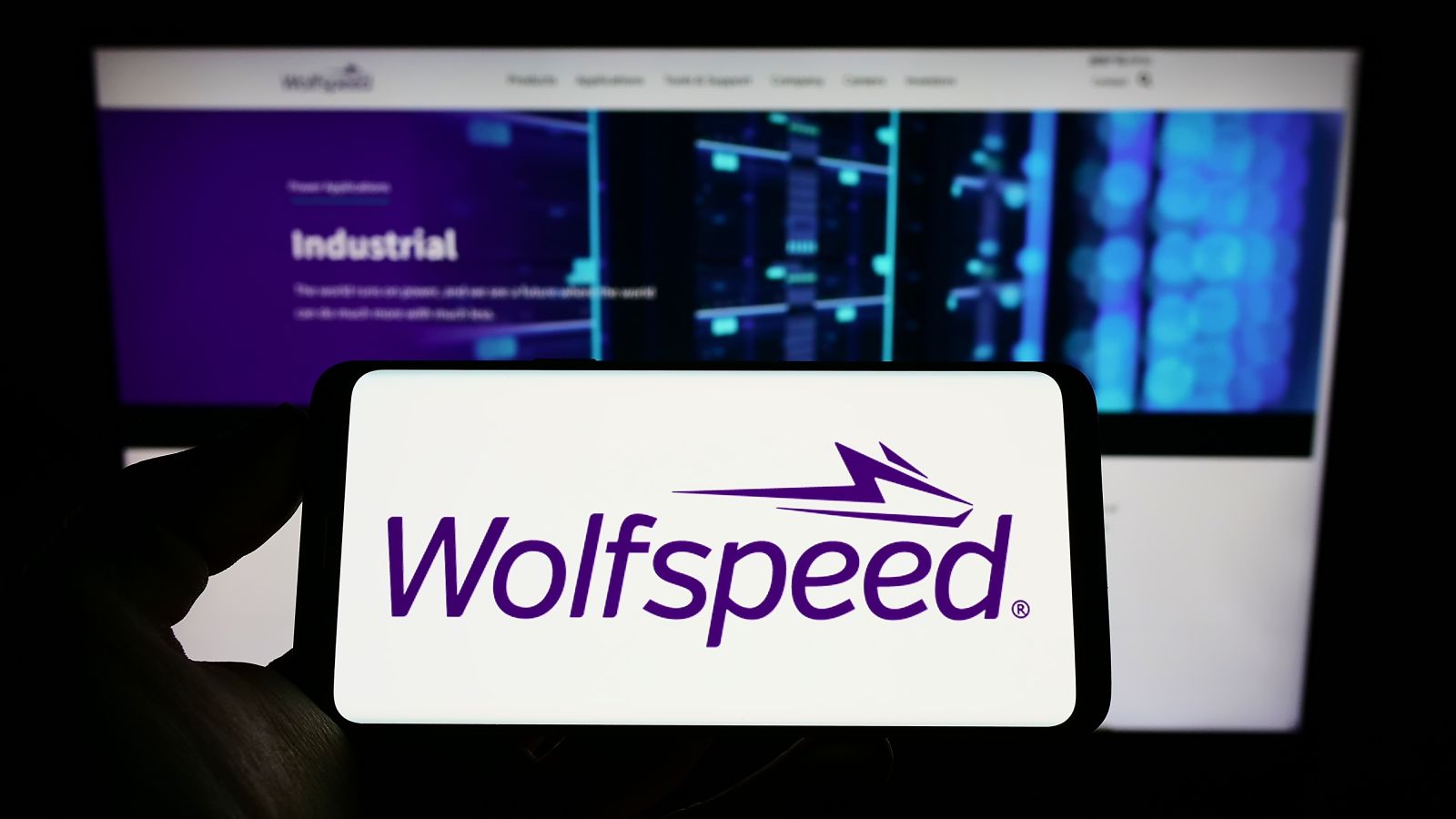 The logo for Wolfspeed displayed on a smartphone screen by T_ Schneider via Shutterstock