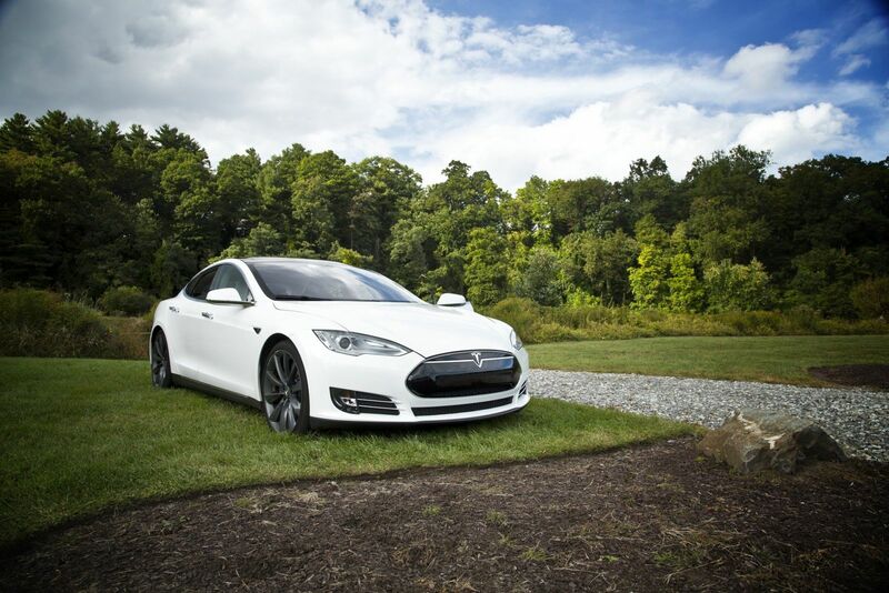 Tech (Ecommerce, Social Media, etc.) - White Tesla with Outdoor Background