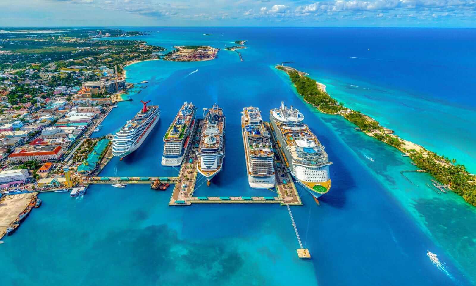 Cruise ships docked at port of call by Fernando Jorge via Unsplash