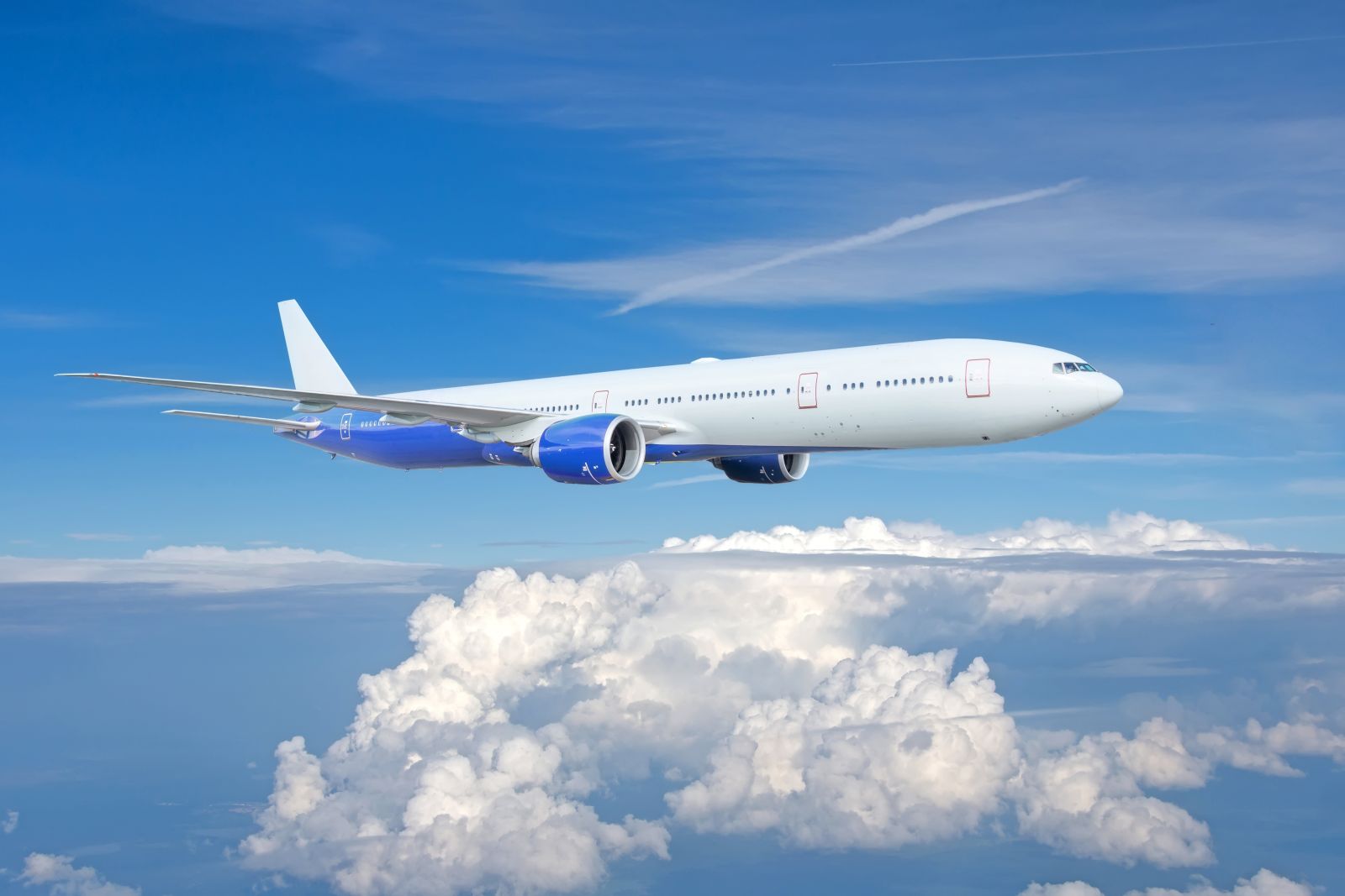 Large passenger jet airliner by aapsky via Shutterstock