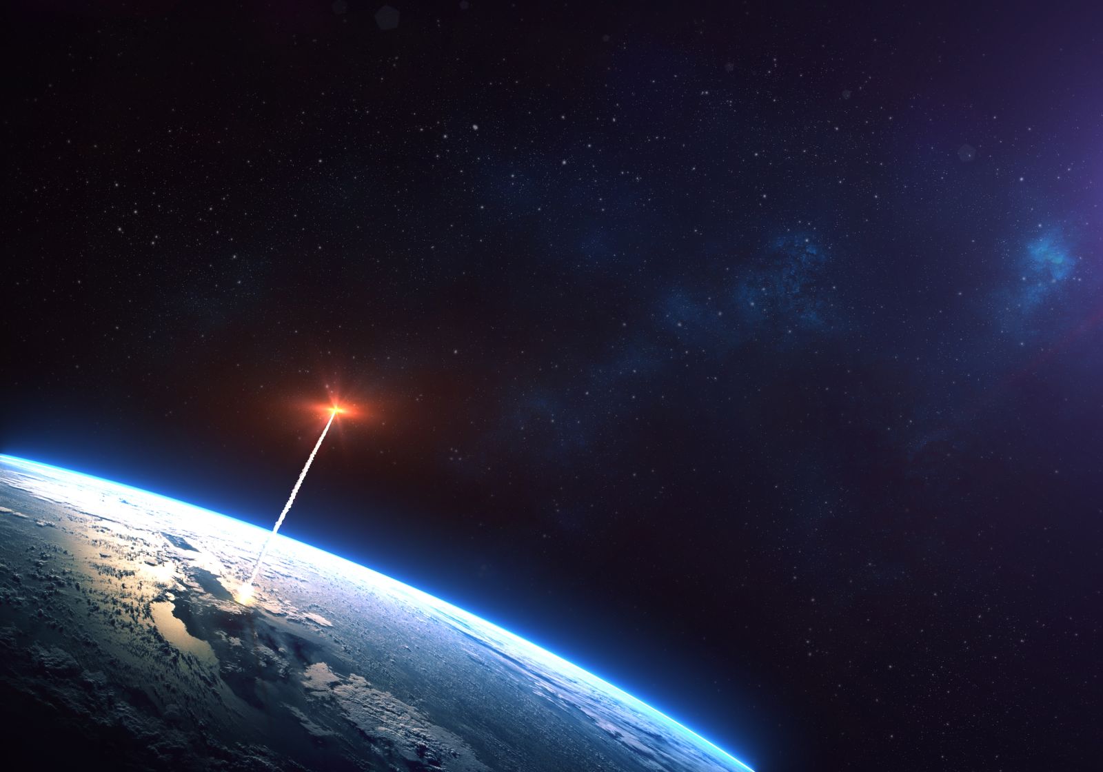 Rocket launch from the Earth planet through the clouds with a bright glow of the engine on the orbit and a bright blue nebula galaxy_ Elements of this image furnished by NASA_ Image by Anton