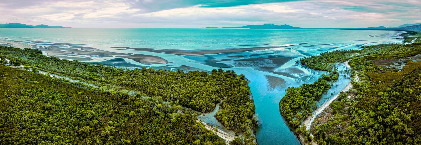 Weather - River delta flowing into the ocean by Coral_Brunner via iStock